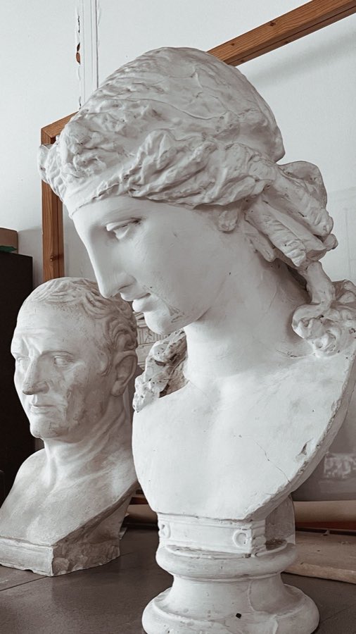 Classical plaster busts in a studio